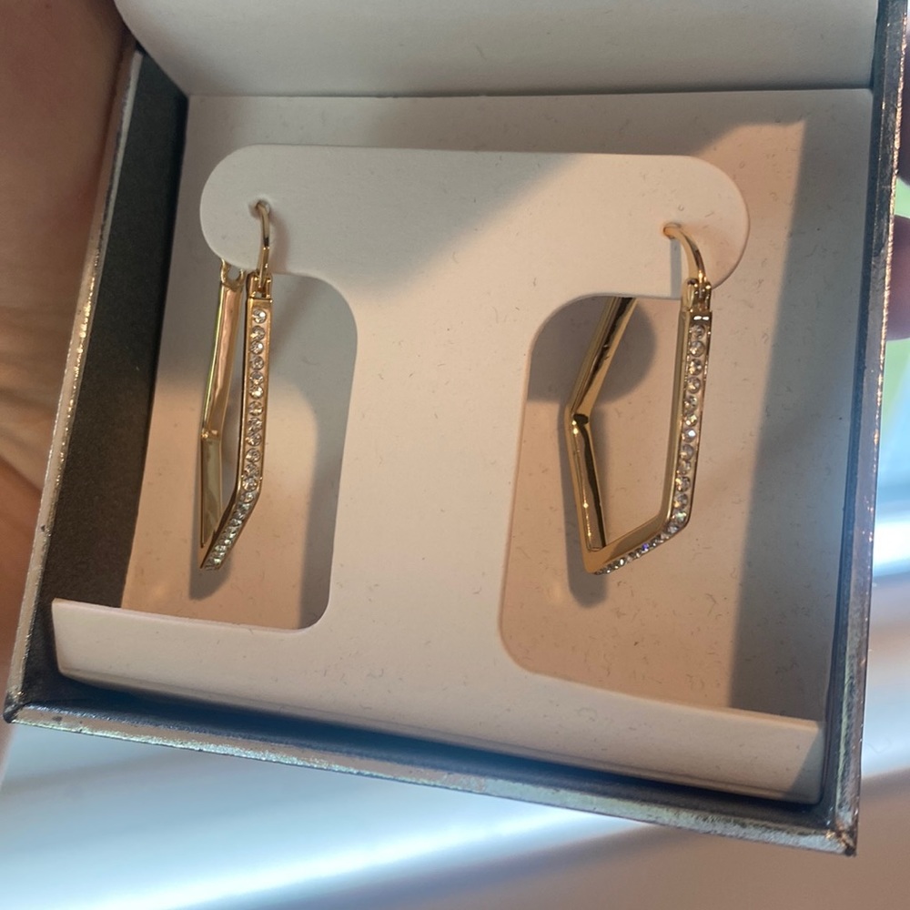 Gold brass earrings. Still in the box!